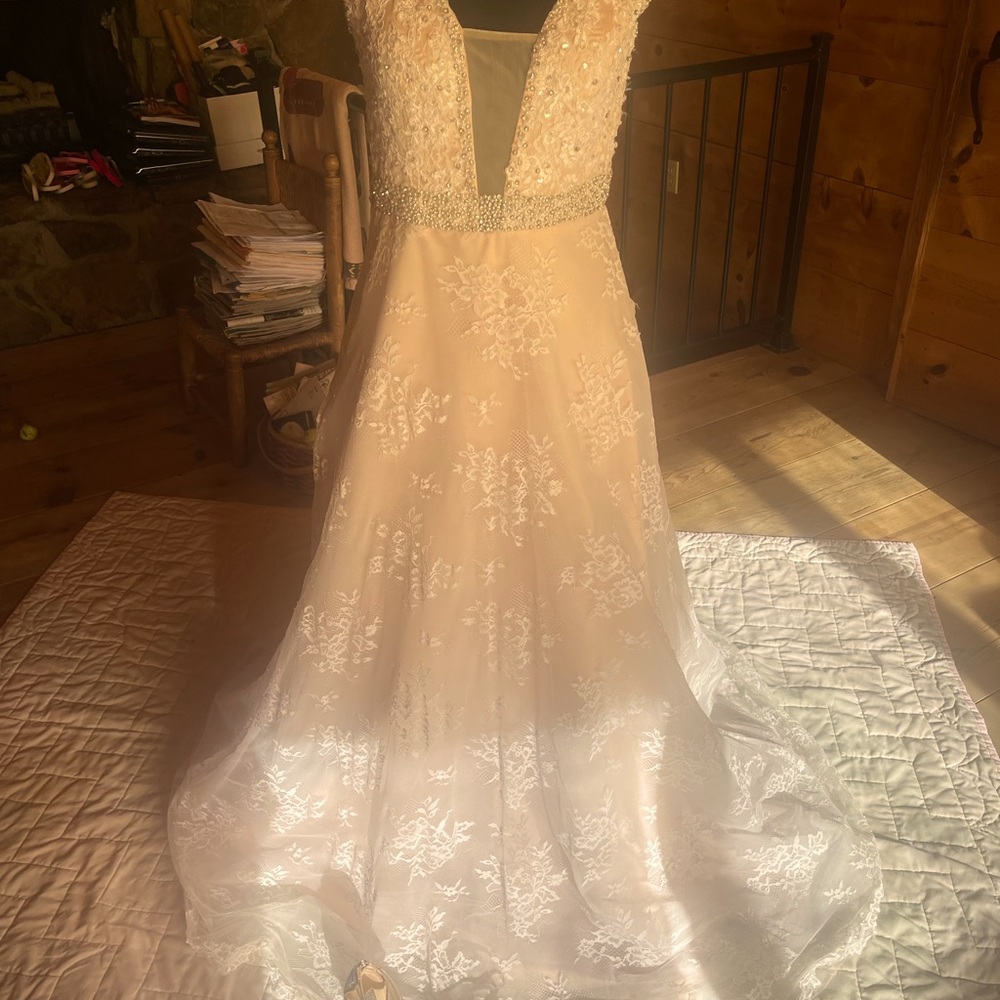 MO designer,Janay Deann.Blush color. Size 2-4.  Never worn; excellent condition.